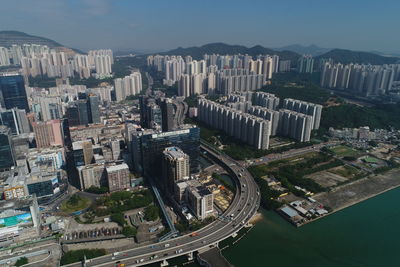 High angle view of buildings in city against sky