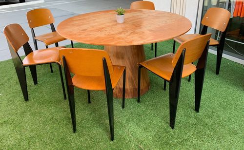 High angle view of empty chairs and table in restaurant