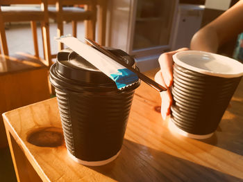 Close-up of coffee cup on table