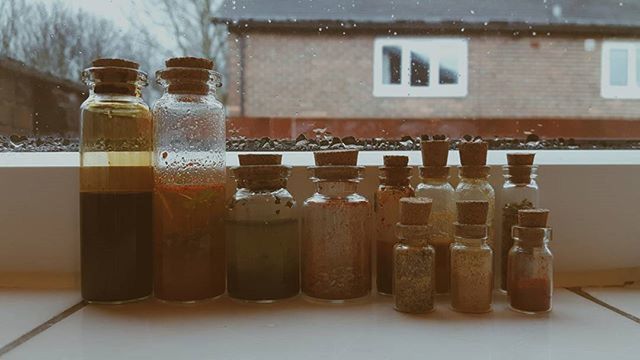 indoors, food and drink, side by side, still life, in a row, table, glass - material, no people, arrangement, close-up, built structure, order, container, day, window, wood - material, drink, architecture, bottle, metal