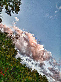 Low angle view of smoke against sky