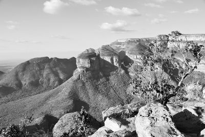 Scenic view of rocks against sky