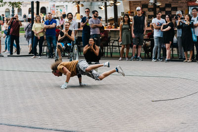 Group of people sitting outdoors