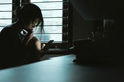 Woman using smart phone