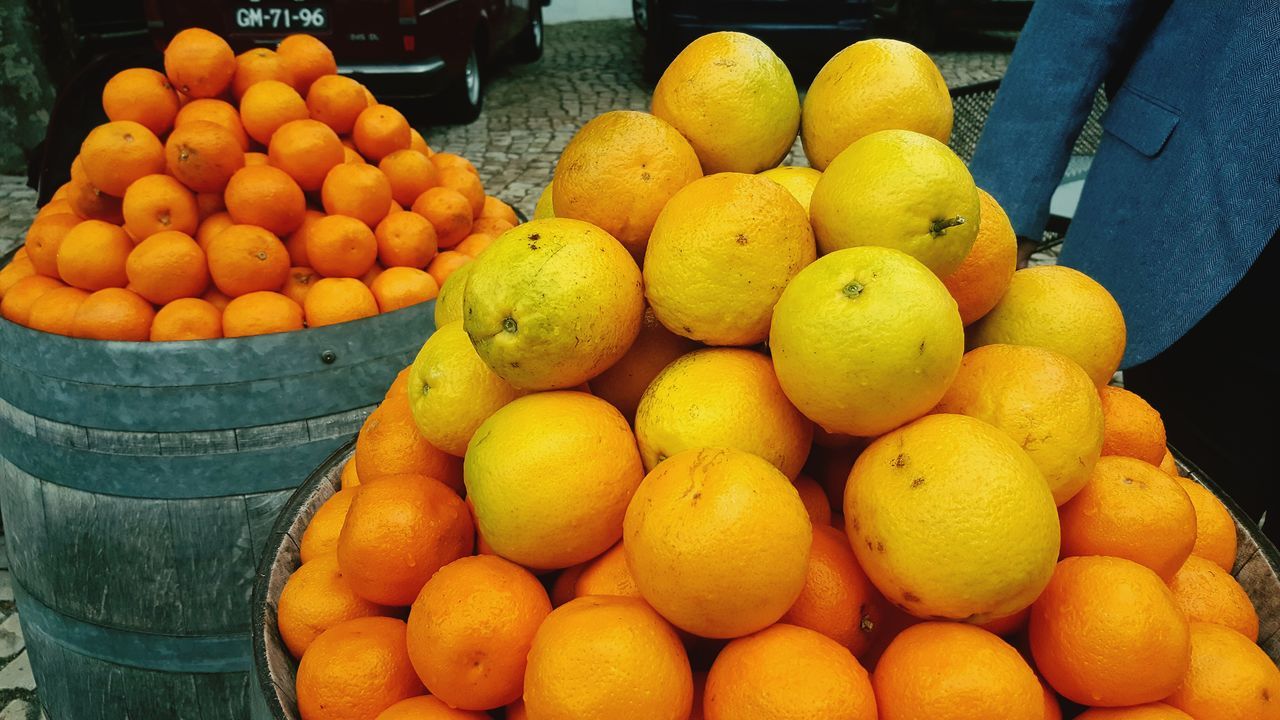 fruit, freshness, food, orange - fruit, healthy eating, citrus fruit, food and drink, market stall, yellow, for sale, no people, close-up, outdoors, day