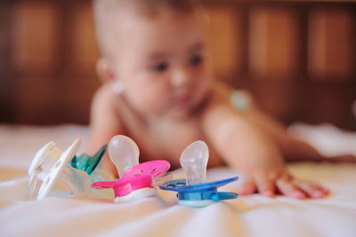 Close-up of baby girl playing