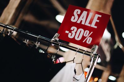 Low angle view of sign in clothing store