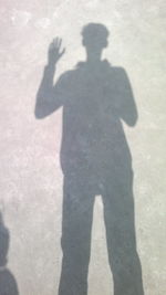 Shadow of man on wall