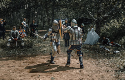 View of warrior standing on field