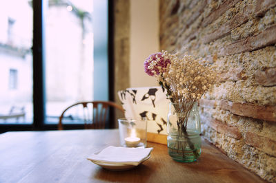 Close-up of flower vase on table