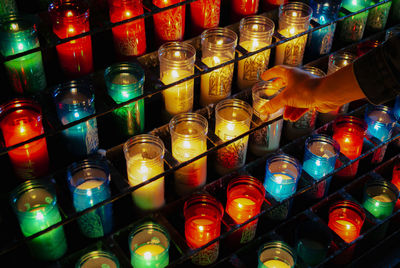 High angle view of multi colored glass bottles