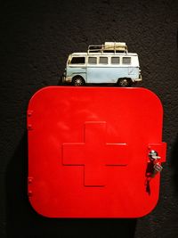 High angle view of red toy car on table