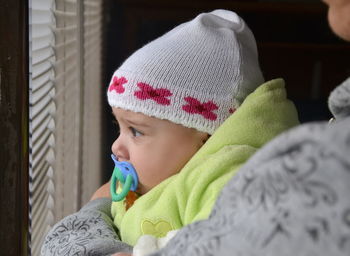 Cute baby girl looking away