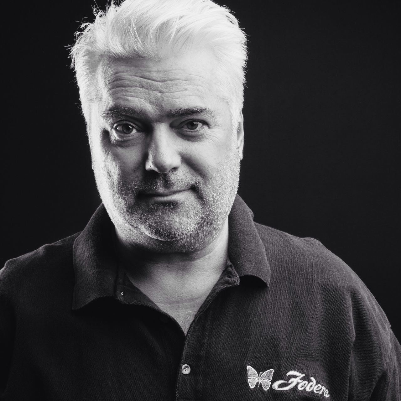 studio shot, black background, young men, headshot, close-up, portrait, front view, beard, looking at camera, mid adult men, human face, young adult, person, indoors, lifestyles, mid adult, copy space, serious