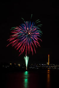 Firework display at night