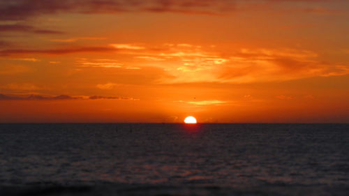 Scenic view of sunset over sea