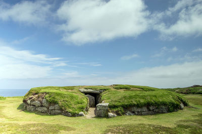 Scenic view of rocks against sky