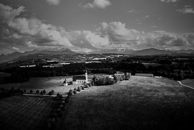 Scenic view of landscape and mountains against sky