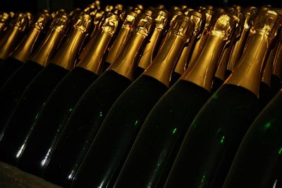 High angle view of bottles on shelf
