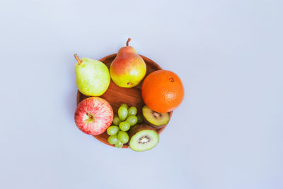 High angle view of fruits on white background