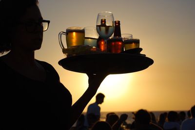 Close-up of silhouette waitress 