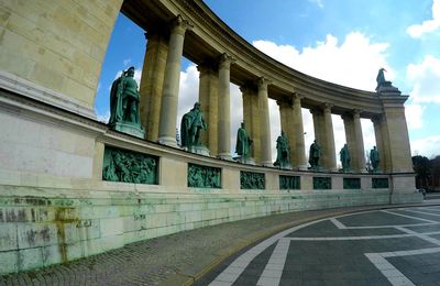 Low angle view of statue against cloudy sky