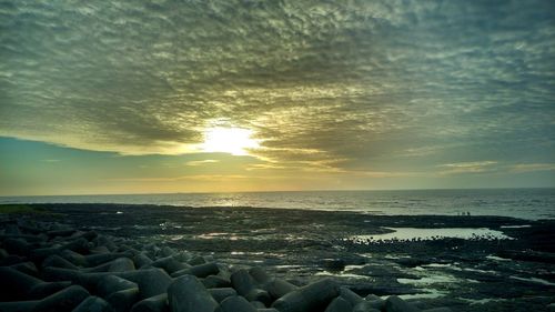 Scenic view of sea at sunset