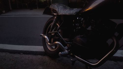 Close-up of bicycle on road