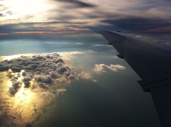 Aerial view of clouds over sea during sunset