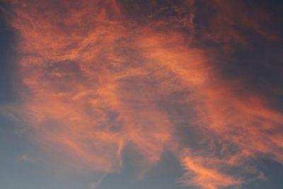 Low angle view of dramatic sky during sunset