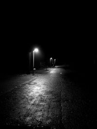 Illuminated street lights during winter at night