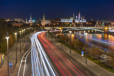 High angle view of light trails on road at night