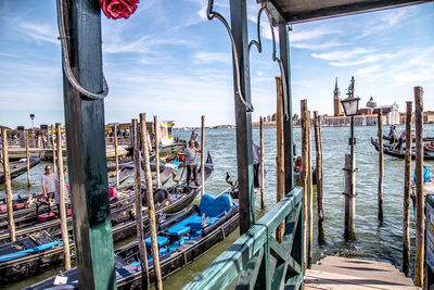 Panoramic view of boats moored at harbor