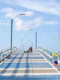 Pier over sea against sky