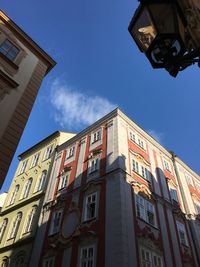 Low angle view of building against blue sky