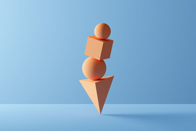 Close-up of lamp against blue background