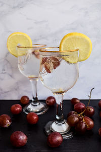 Close-up of fruits with ice cream and table