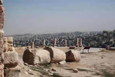 Panoramic shot of buildings against clear sky