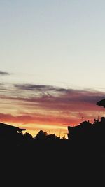 Scenic view of silhouette landscape against sky during sunset