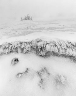 Scenic view of snow covered land against sky in vladeasa mountains 