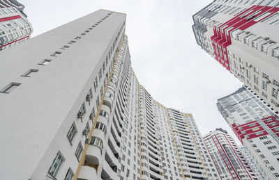 Low angle view of modern buildings against sky