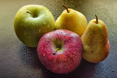 Close-up of apples on table