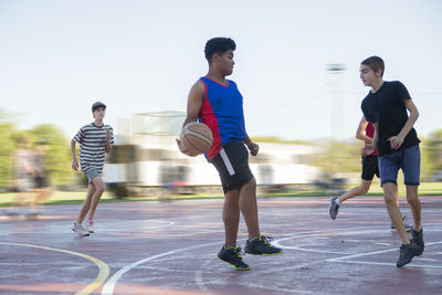 Teen basketball players