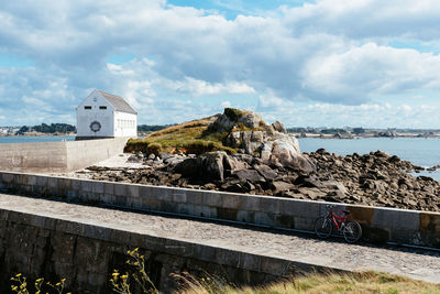 Island of batz, france. bicycle at the harbour of the island of batz a sunny day of summer