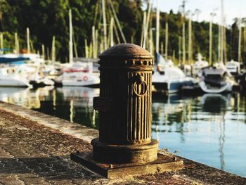 Close-up of pier at harbor