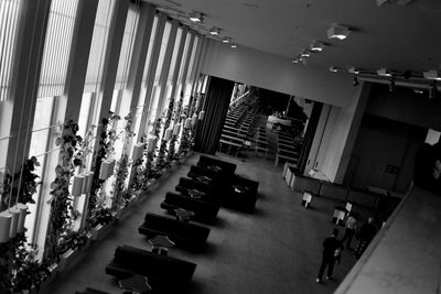 Interior of illuminated shopping mall