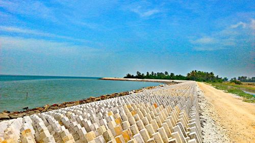 Scenic view of sea against blue sky