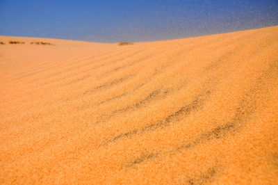 Scenic view of desert against sky