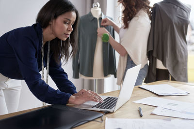 Business colleagues working in office