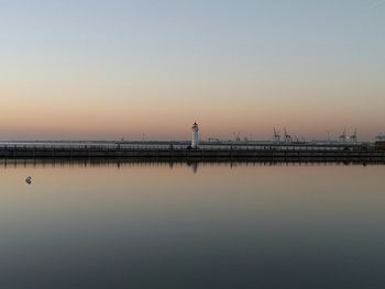 Scenic view of calm sea at sunset